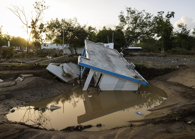 Vivienda arrasada por el huracán Fiona en Villa Esperanza, Salinas. Foto: Alejandro Granadillo / AP