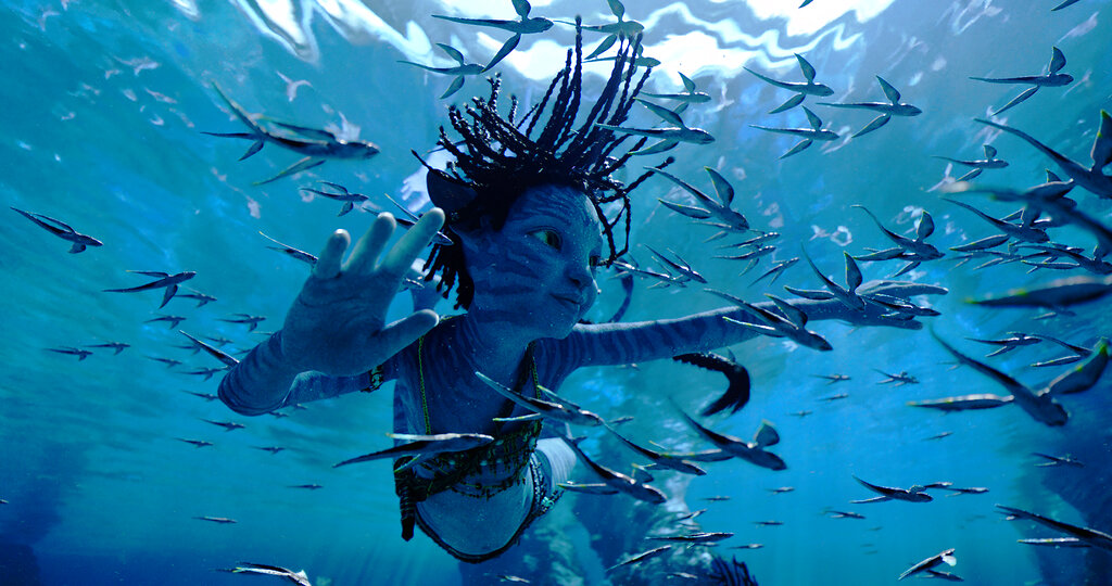 Trinity Bliss en el papel de Tuk en una escena de "Avatar: The Way of Water". (Foto: 20th Century Studios vía AP)